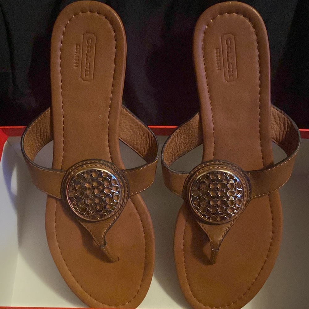 Coach sandals.